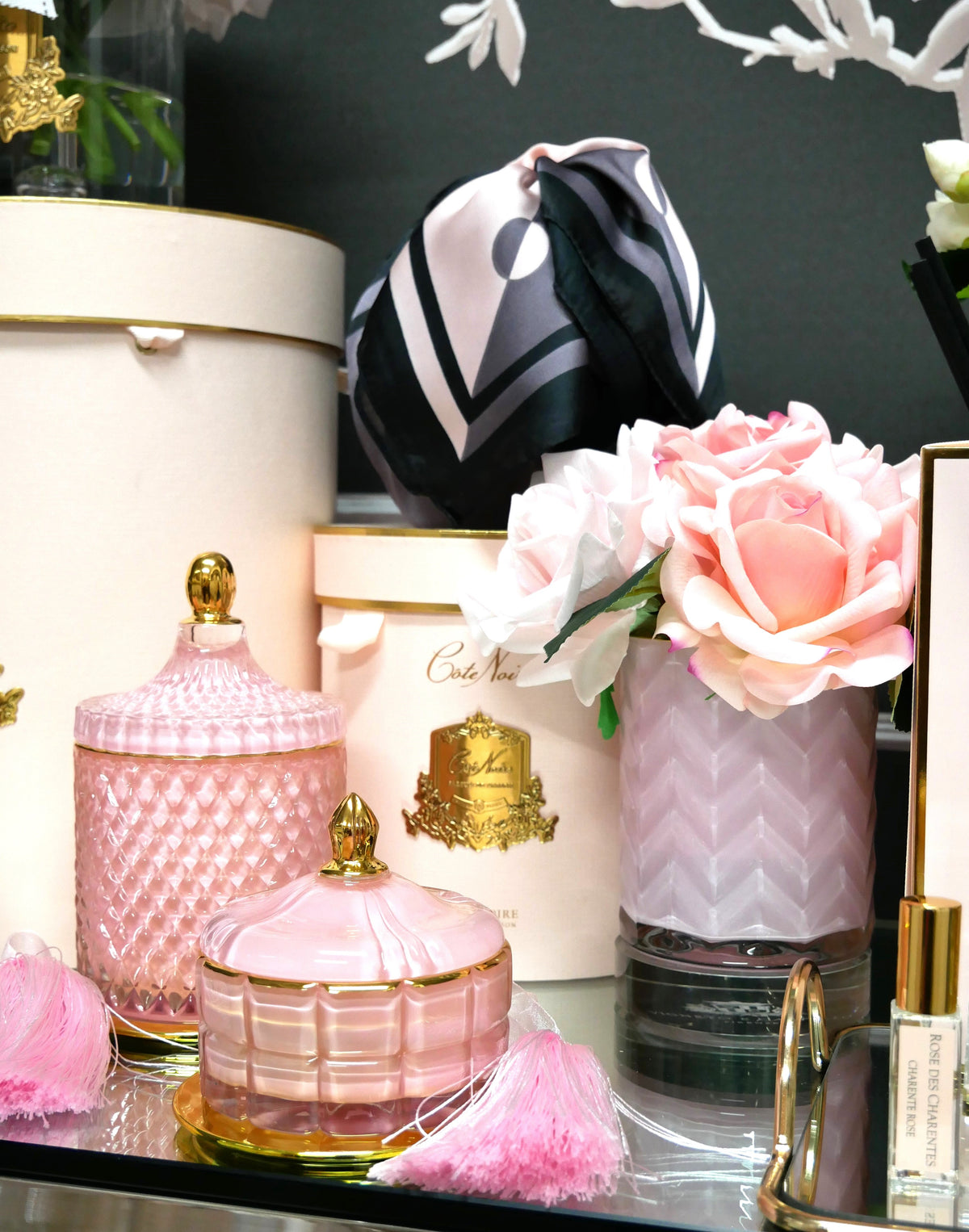 Cote Noire herringbone flower in pink glass, pink roses, group shot