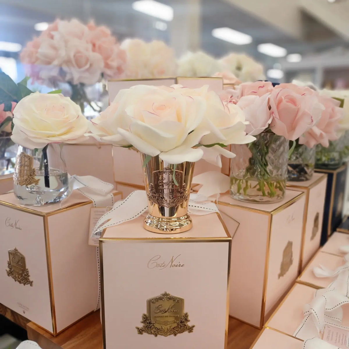 Cote Noire seven rose bouquet in pink blush, lifestyle shot