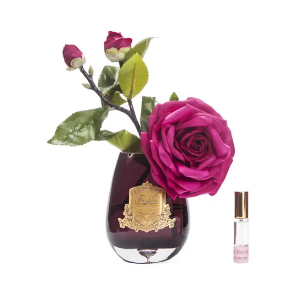 Cote Noire tear drop glass tea rose arrangement in carmine red with gold badge