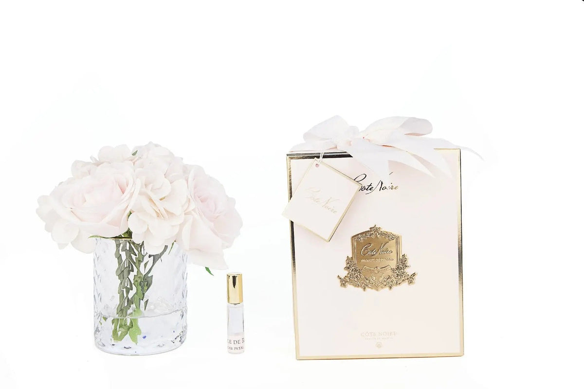 Cote Noire herringbone glass flower diffuser with roses and hydrangeas, close up