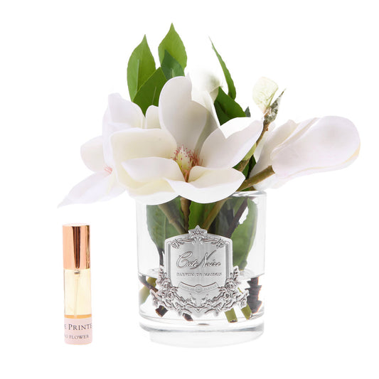 Cote Noire natural touch pink magnolia arrangement in clear glass