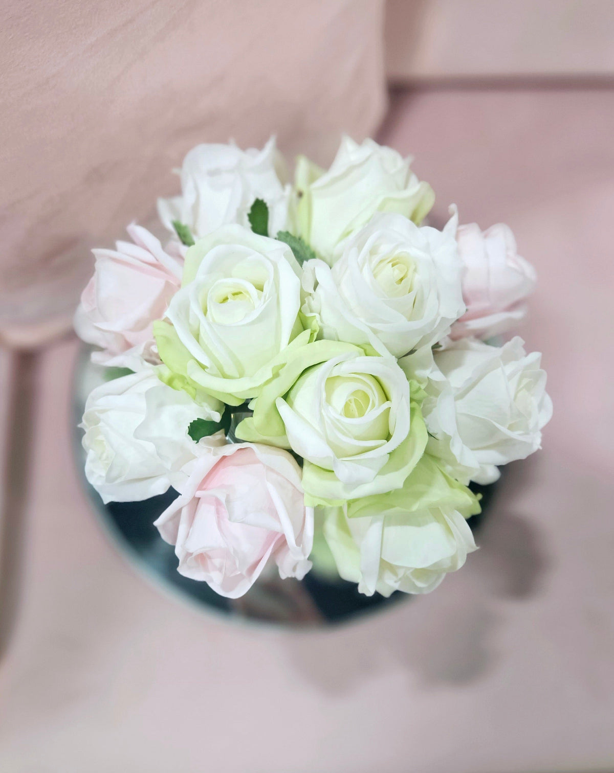 Cote Noire herringbone flower in clear glass with French pink, green and white rose buds, alternate angle