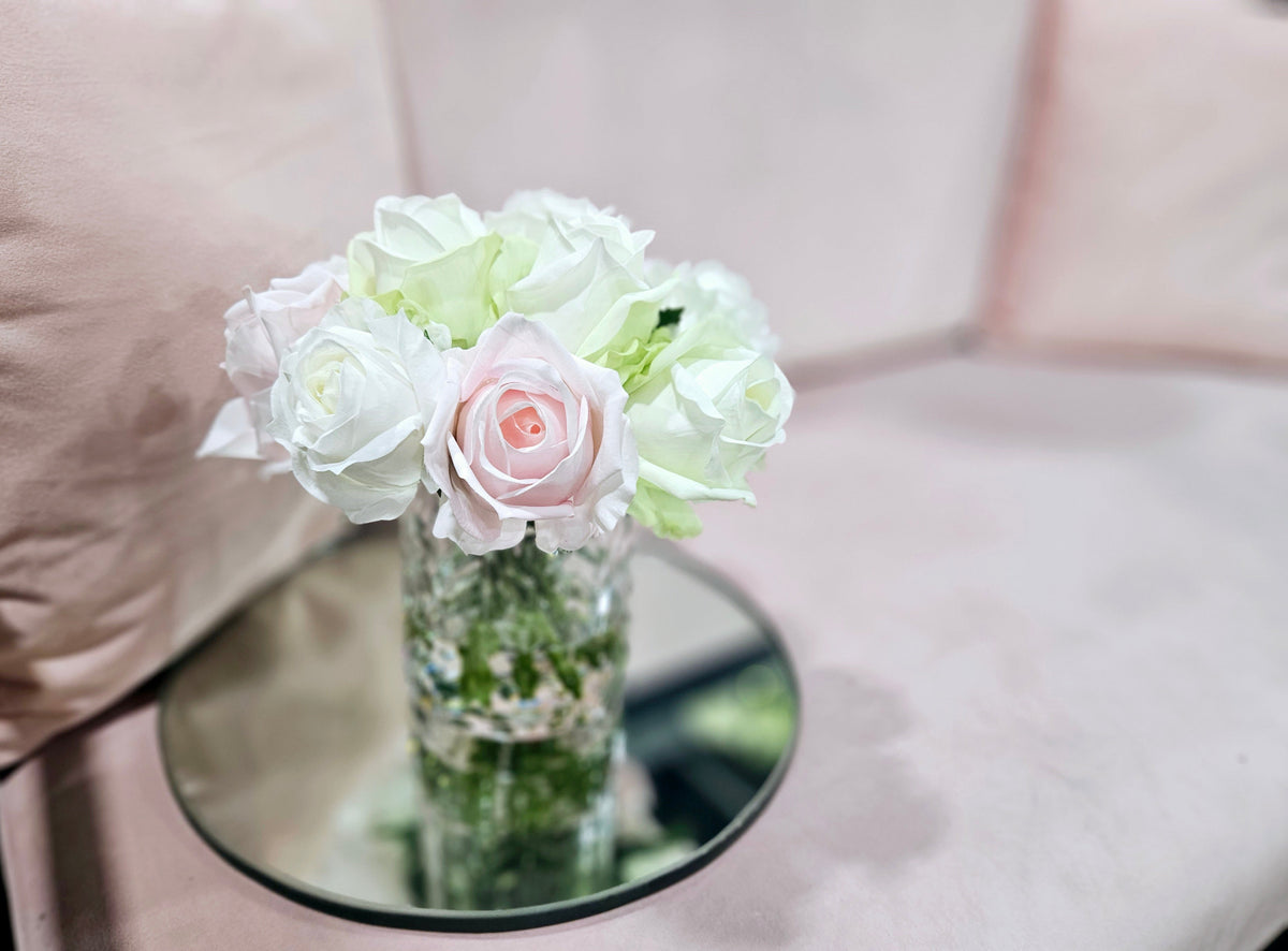 Cote Noire herringbone flower in clear glass, French pink, green and white rose buds, close up